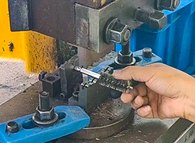 Stamping-the-tail for gun cleaning brush